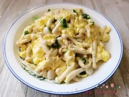 Make White mushroom fried eggs step 6
