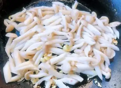 Make White mushroom fried eggs step 5