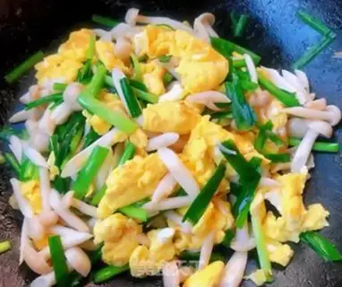 Make White mushroom fried eggs step 8