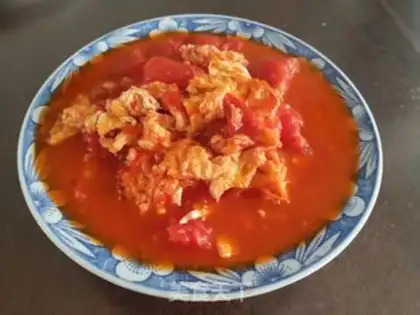 Make Tomato fried eggs step 5