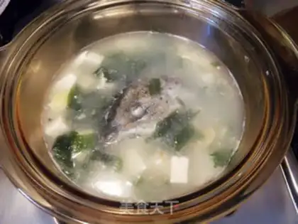 Make Tofu soup with salmon head step 9