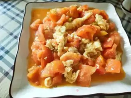 Make Tomato fried eggs step 8