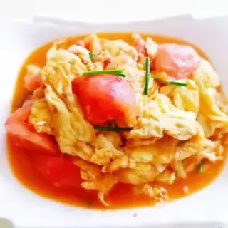 Make Tomato fried eggs step 9
