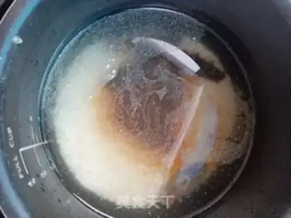 Make Sea gin and egg congee step 3