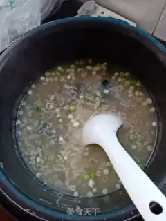 Make Sea gin and egg congee step 6