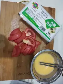 Make Tomato egg tofu soup step 0