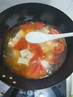 Make Tomato egg tofu soup step 5