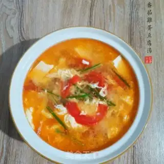 Make Tomato egg tofu soup step 7
