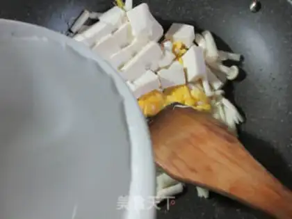Make Seafood mushroom duck egg tofu soup step 5