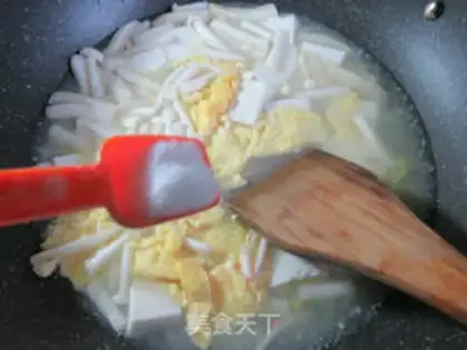 Make Seafood mushroom duck egg tofu soup step 7