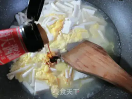 Make Seafood mushroom duck egg tofu soup step 8