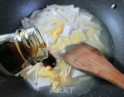 Make Seafood mushroom duck egg tofu soup step 9