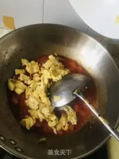 Make Tomato fried eggs step 10