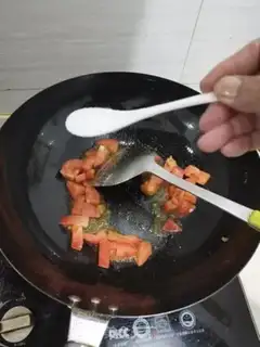 Make Tomato cheese and egg soup step 2