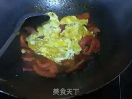 Make Tomato fried eggs step 10