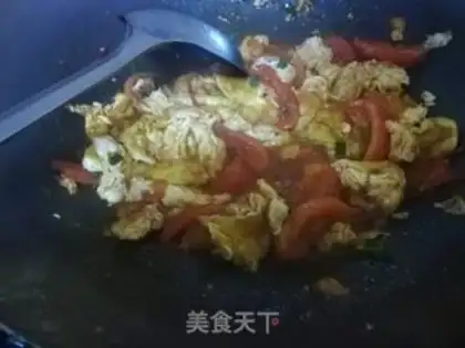 Make Tomato fried eggs step 11