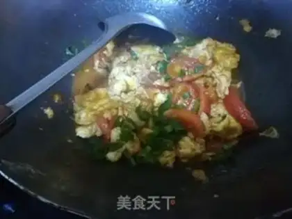 Make Tomato fried eggs step 12