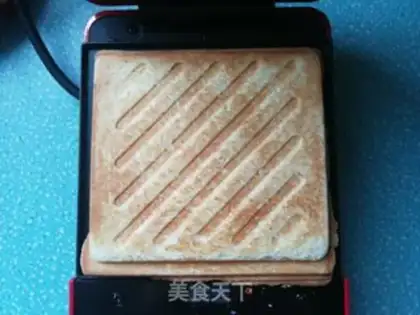Make Tomato egg cheese sandwich step 10