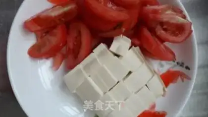 Make Tomato tofu fish head soup step 1