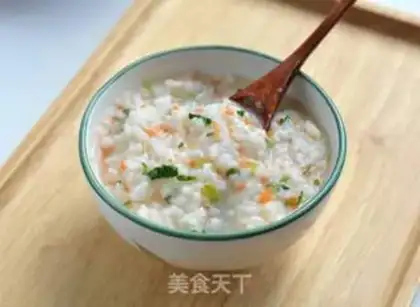 Make Carrot greens and rice porridge step 10