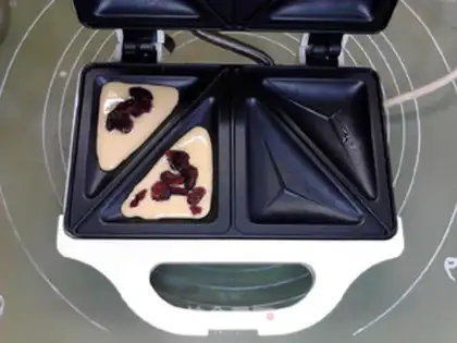 Make Creaming cranberry triangle step 6