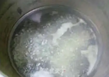 Make Peanut bean rice congee step 8