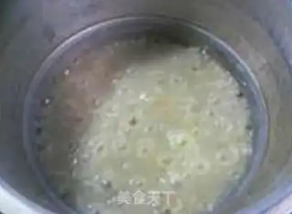 Make Peanut bean rice congee step 15