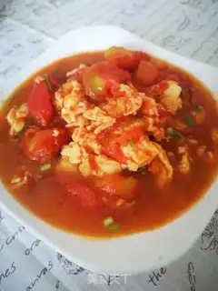 Make Tomato fried eggs step 9