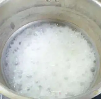 Make Porridge of rice with green bean goose sausages step 9