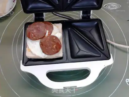 Make Spam and egg cheese sandwiches step 11