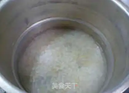 Make Oatmeal rice congee step 11