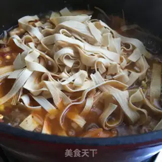 Make Spicy golden needles, fat cow step 12