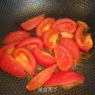 Make Onion eggs fried tomatoes step 4