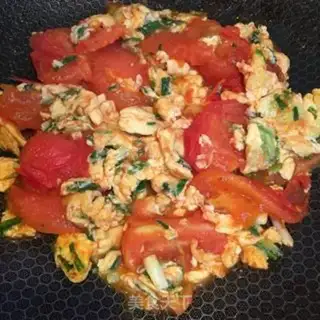 Make Onion eggs fried tomatoes step 7