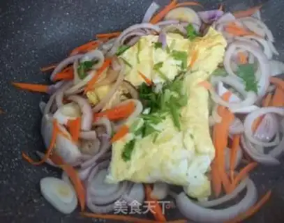 Make Onion carrot fried eggs step 6
