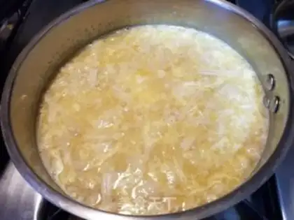 Make Pyramid needle and mushroom corn soup step 9
