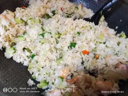 Make cucumber shrimp fried rice step 7