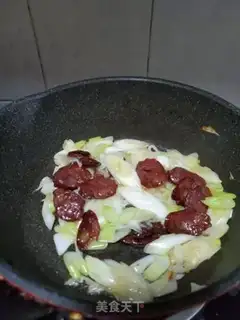 Make Onion fried sausage step 6