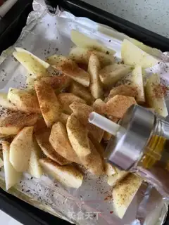 Make Spicy baked fries step 2