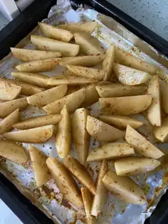 Make Spicy baked fries step 3