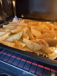 Make Spicy baked fries step 4
