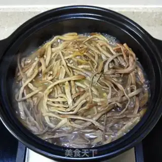 Make A chicken stew with yellow broccoli step 14