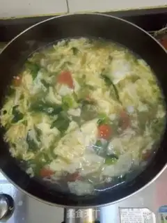Make Tomato Mountain poach soup step 6