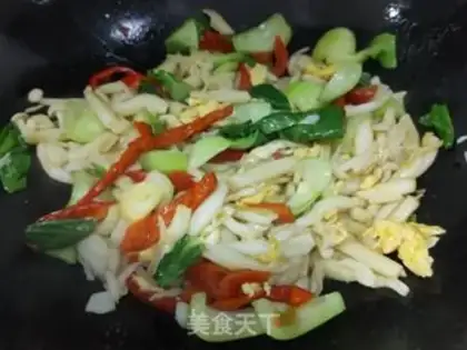 Make White mushroom fried eggs step 13