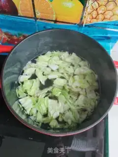Make Shrimp spinach hand noodles step 11