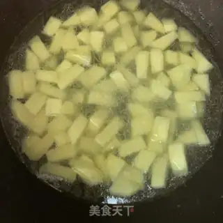 Make Curry potatoes and rice step 2