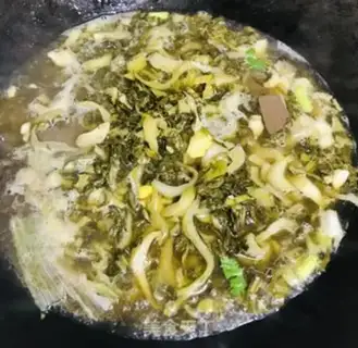Make A sour fan stewed with duck blood step 7