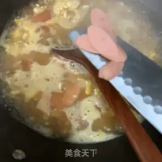 Make Tomato egg and ham noodles step 8