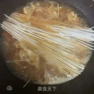 Make Tomato egg and ham noodles step 9