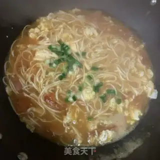 Make Tomato egg and ham noodles step 11